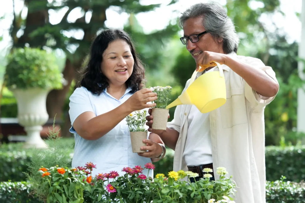 Happy seniors enjoying gardening