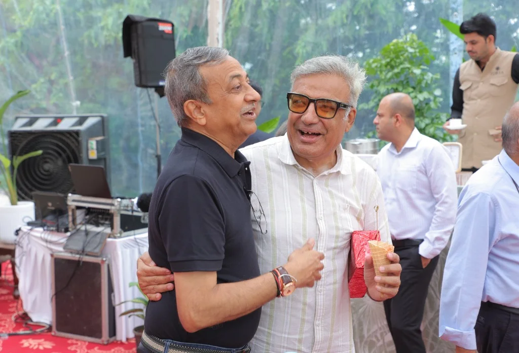 Senior residents sharing joyful friendship and community life at CHL Urja retirement home